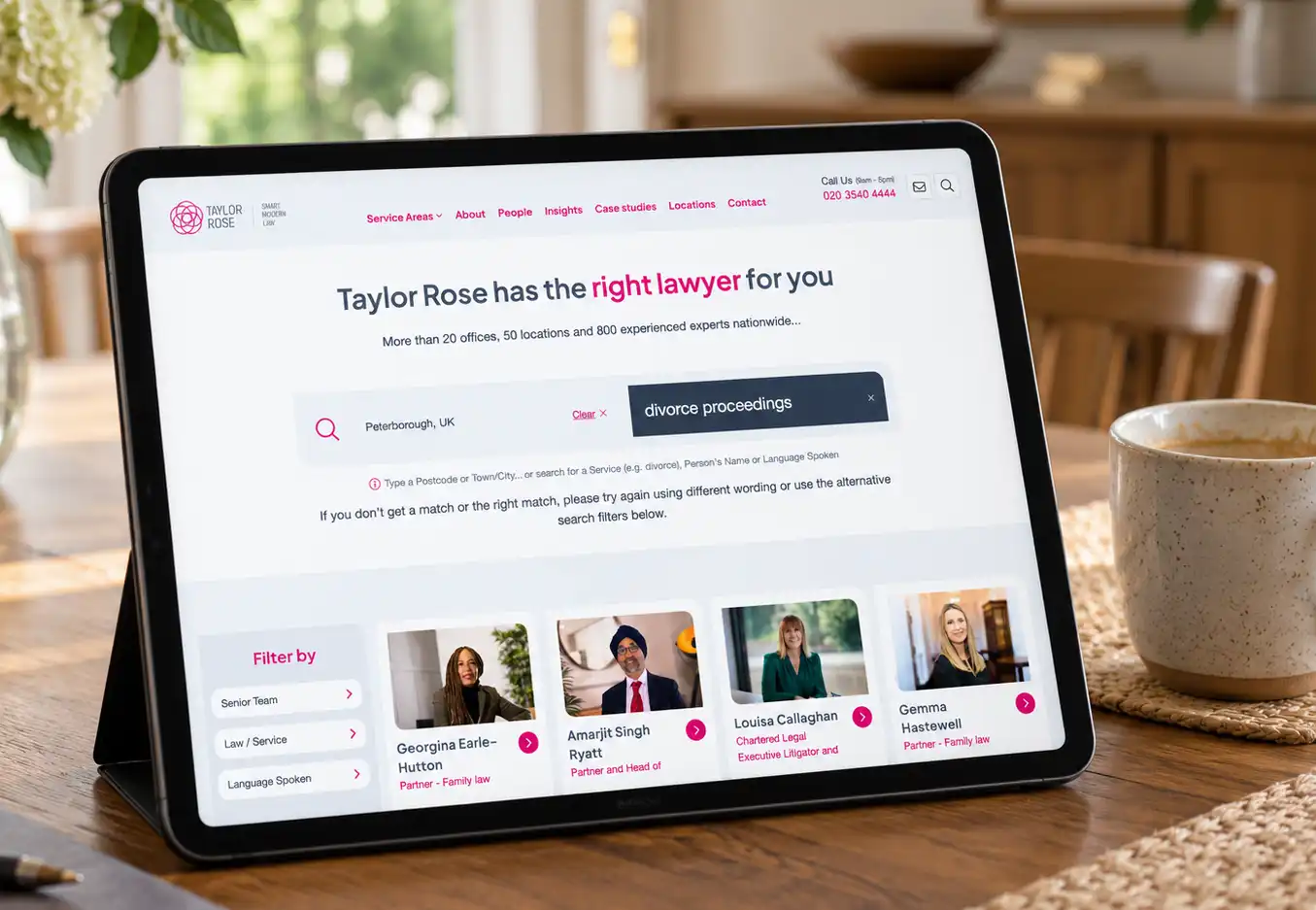 Taylor Rose website search on a tablet, helping visitors find lawyers by location and service