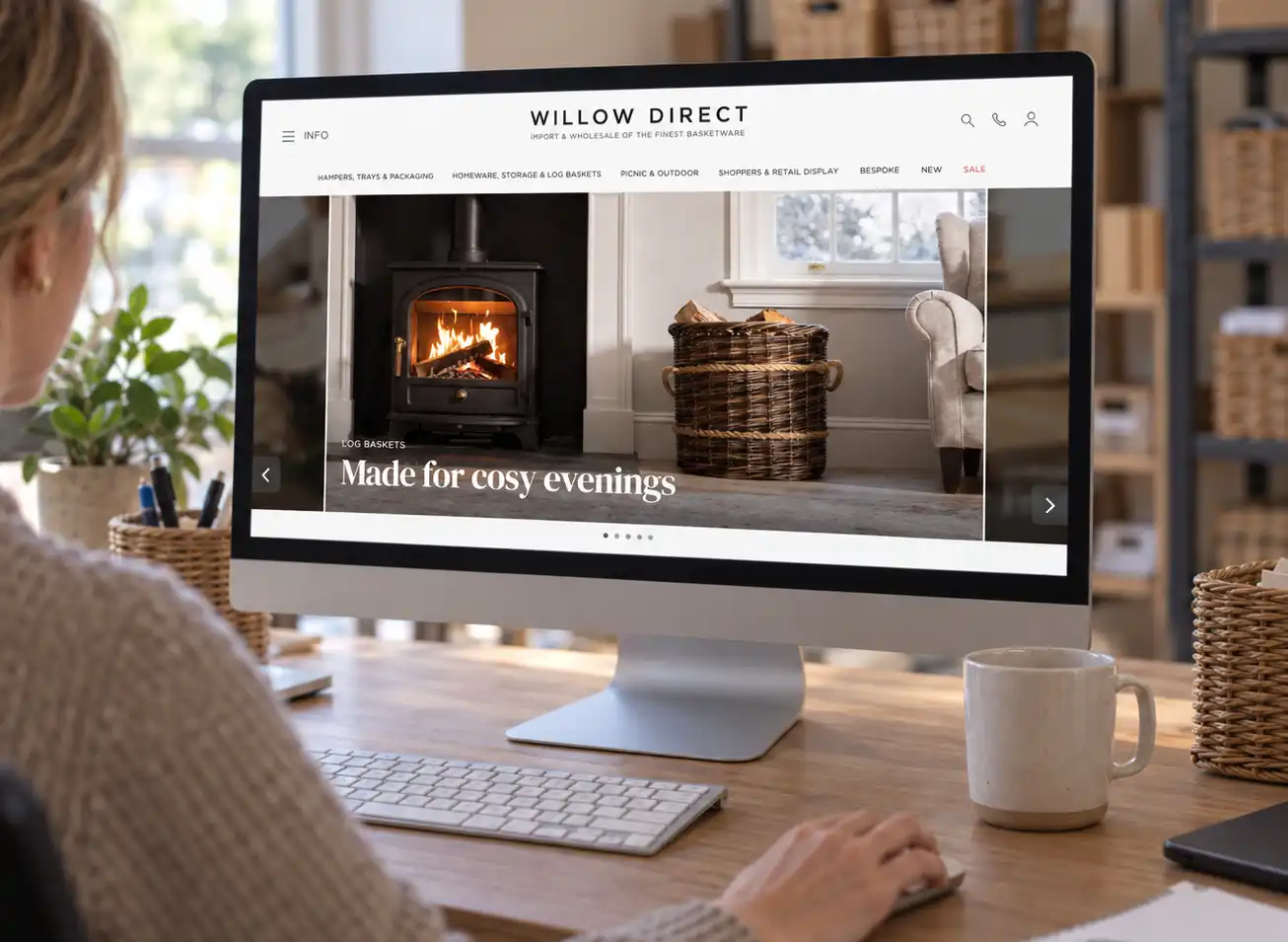 Willow Direct website on a desktop, showing a log basket homepage